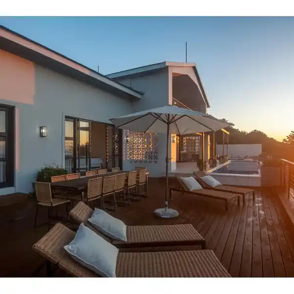 MODERN COASTAL GEM WITH DUAL SUNSET VISTAS