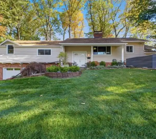 REFINED RESIDENCE FEATURING HARDWOOD AND CHANDELIERS