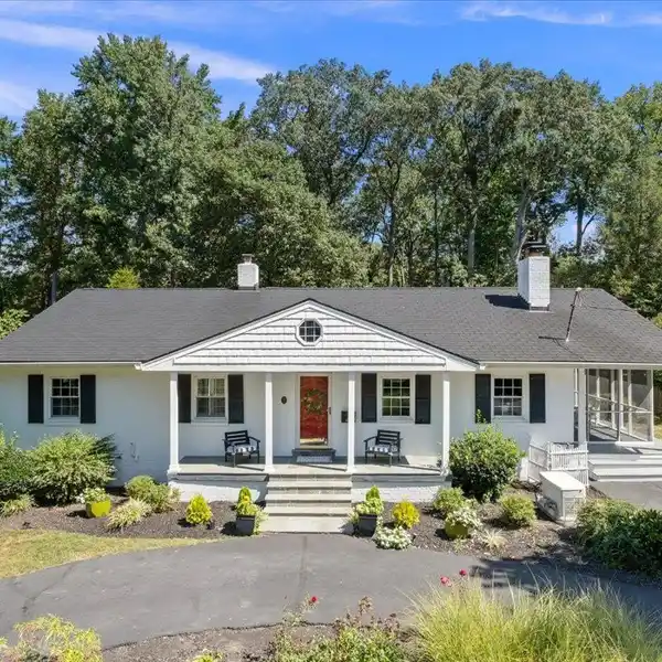 TURNKEY RAMBLER WITH HIGH-END THERMADOR KITCHEN AND EXPANSIVE GROUNDS