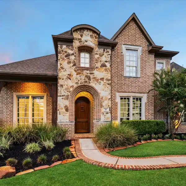 SPACIOUS CREEKSIDE HOME WITH LUXURY UPGRADES
