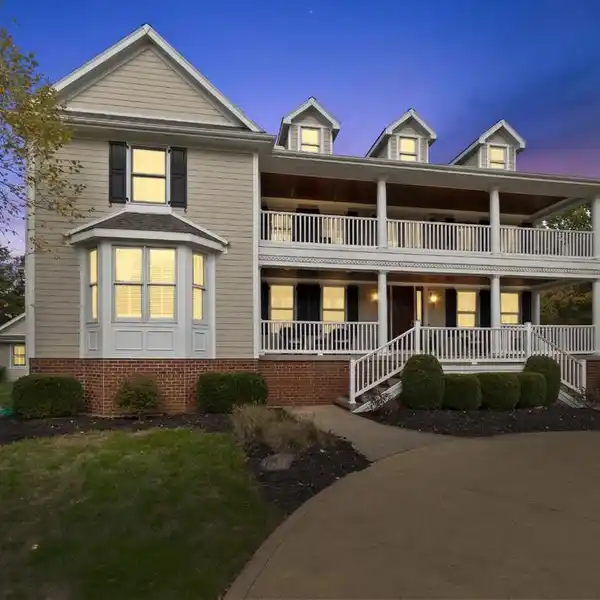 UNPARALLELED PRIVACY AND SERENITY IN THIS RARE COLONIAL HOME