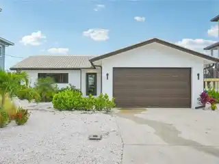 Remodeled Waterfront Pool Home in Prime Location
