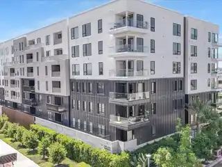 Resort-Style Amenities: Clubhouse, Olympic Pool, and Fitness Center