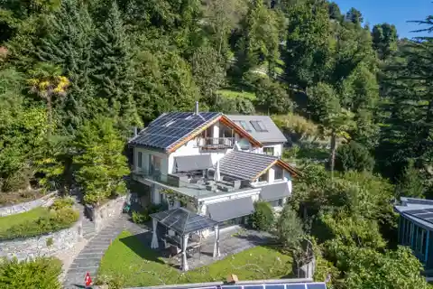 Sustainable Home with Solar Panels and Privacy