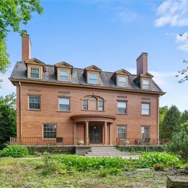 OWN AN ENTIRE CITY BLOCK WITH A MAGNIFICENT MINI MANSION