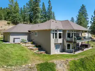 Beautifully Maintained Custom Home in a Gated Community