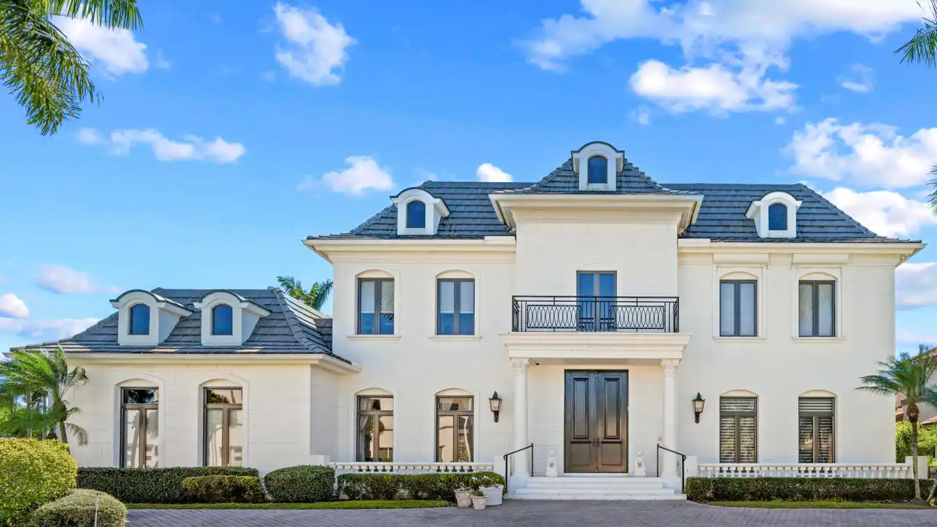 Exquisite Custom Home Nestled in the Heart of Boca Grove Plantation