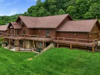Massive Log Cabin Home on Expansive Acreage