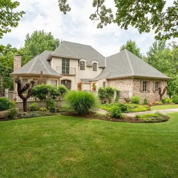 CUSTOM HOME IN THE EXCLUSIVE GATED EDINBOROUGH POINTE COMMUNITY