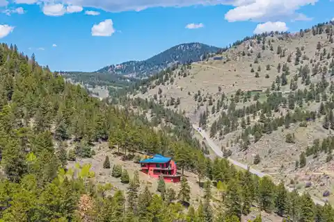 Eco-Modern Escape with Forest, Stream, and Pond