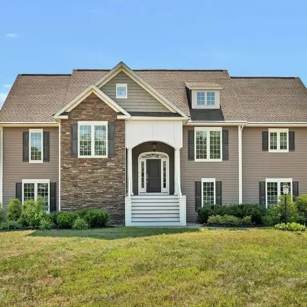 COMFORTABLE RIVERFRONT LIVING ON OVER THREE ACRES