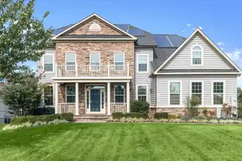 Spectacular Colonial Tucked Away in Prestigious Community