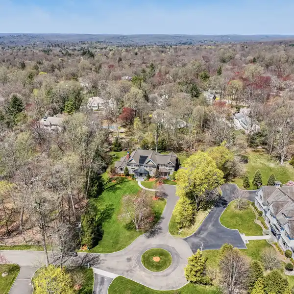 EXCEPTIONAL CUSTOM COLONIAL ON A TRANQUIL CUL-DE-SAC