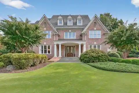 Resort-Style Living in Gated Riverfront Retreat