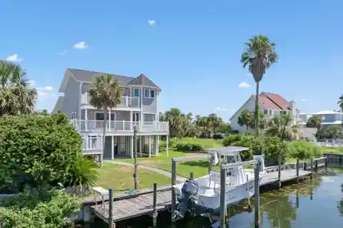 Coastal Retreat in Sought-After Lafitte Cove