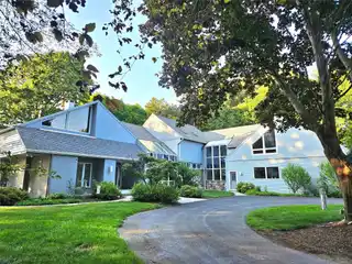 Sleek Lined Contemporary Home with Stunning Lake Views