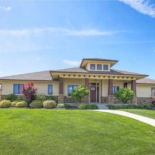METICULOUSLY MAINTAINED REVERSE 1.5-STORY HOME