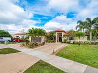 BEAUTIFUL FOUR BEDROOM POOL HOME ON THE LAKE AWAITS YOU