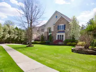 Grand Custom Home with 6-car Garage
