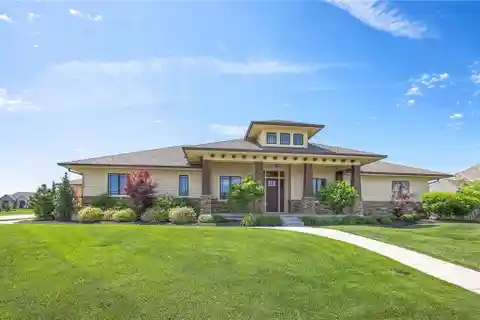 Meticulously Maintained Reverse 1.5-story Home