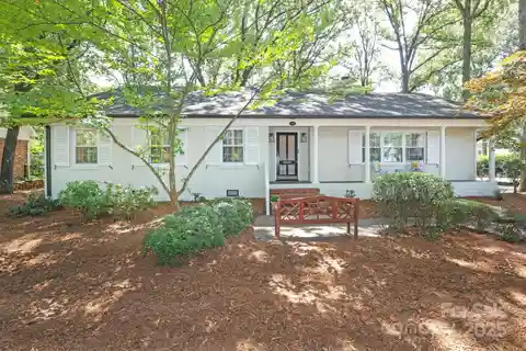 Charming One and a Half Story Home on a Private Corner Lot