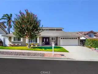 Relaxing Backyard Retreat with Patio and Fountain
