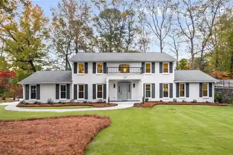 Stately Brick Residence with Impeccable Designer Updates