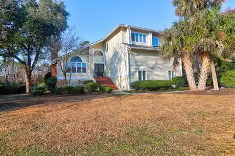 Custom Waterfront Living with Private Airstrip Access
