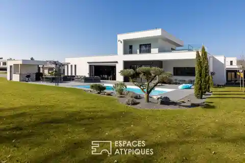 Architectural Gem Overlooking Golf Course Greens