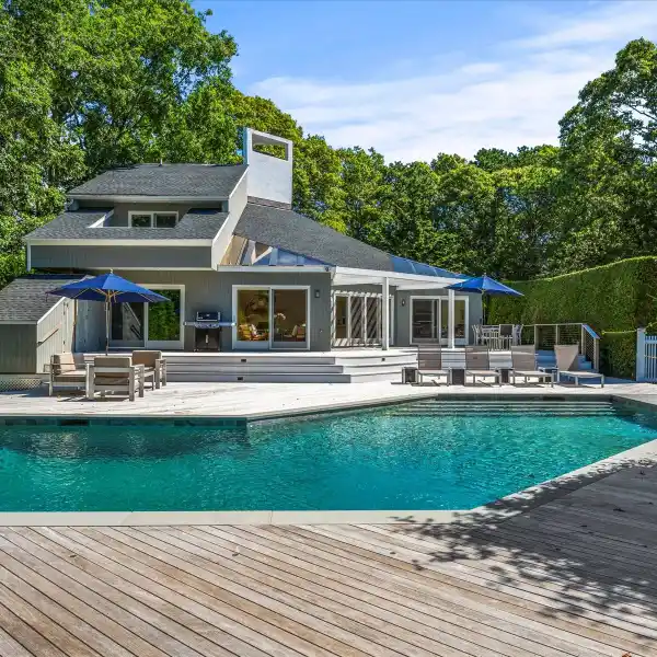 SUN-FILLED CONTEMPORARY HOME ON A PRIVATE ACRE