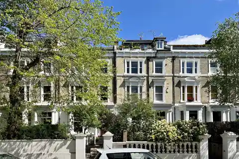 High-Ceilinged Retreat with Modern Finishes and Garden