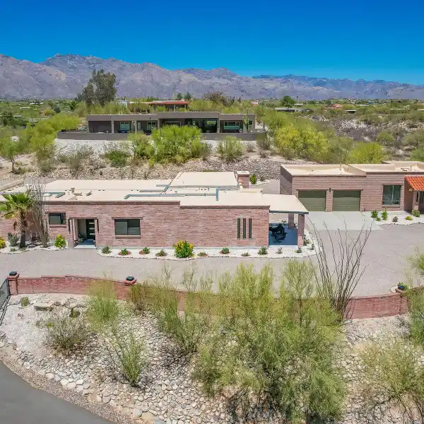 EXQUISITELY REMODELED HOME ON A PRIVATE GATED ACRE-PLUS