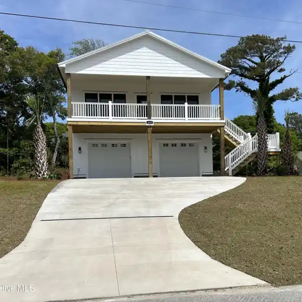 COASTAL LIVING STEPS FROM THE BEACH