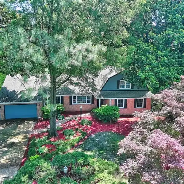 ALL-BRICK HOME ON A SERENE WATERFRONT LOT