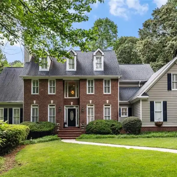 ELEGANT BRICK ESTATE ON 1.5 SERENE ACRES