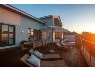Modern Coastal Gem with Dual Sunset Vistas