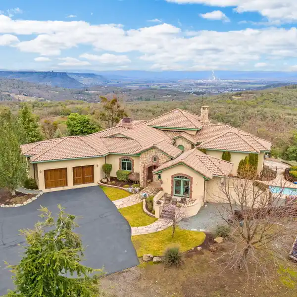 CUSTOM ONE-OWNER HOME ON 61-PLUS ACRES