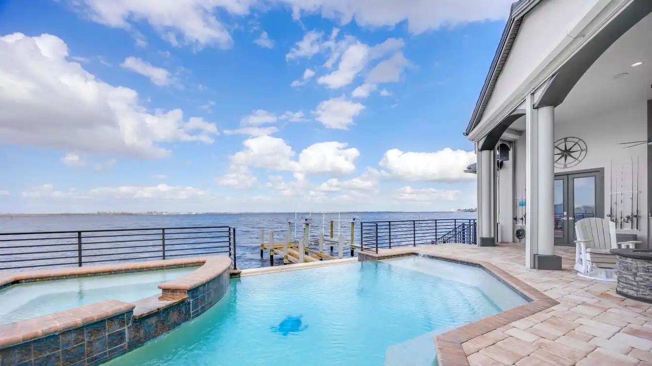 Exquisite Riverfront Estate in a Gated Community