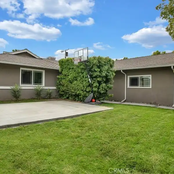 REMODELED HOME WITH SPARKLING POOL AND STYLE