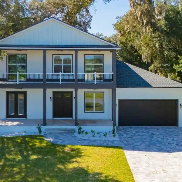 DESIGNER BUILD WITH ELEVATOR AND COVERED PORCHES