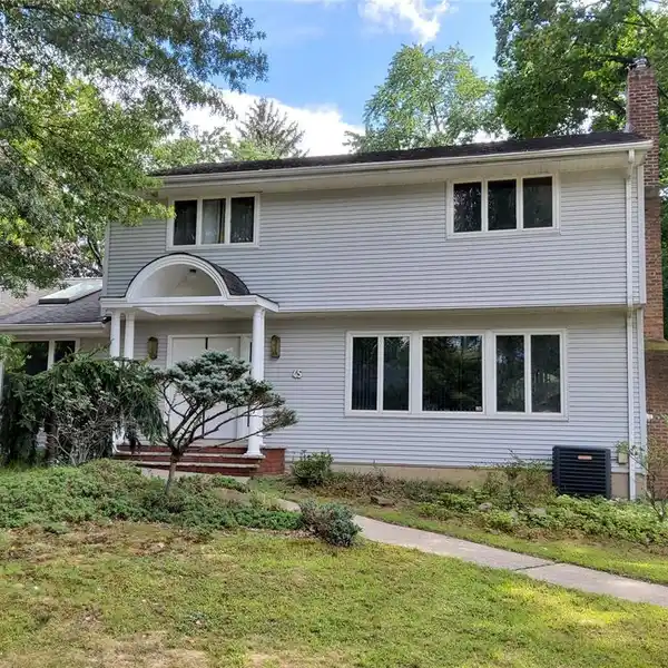 WELL-KEPT CENTER HALL COLONIAL SITUATED IN A PRIME LOCATION