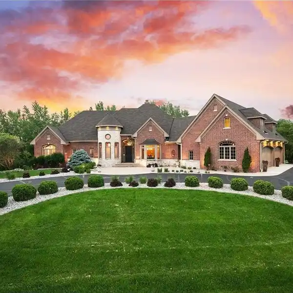 EXCEPTIONAL FORMER MODEL HOME IN COVETED WILD MEADOWS