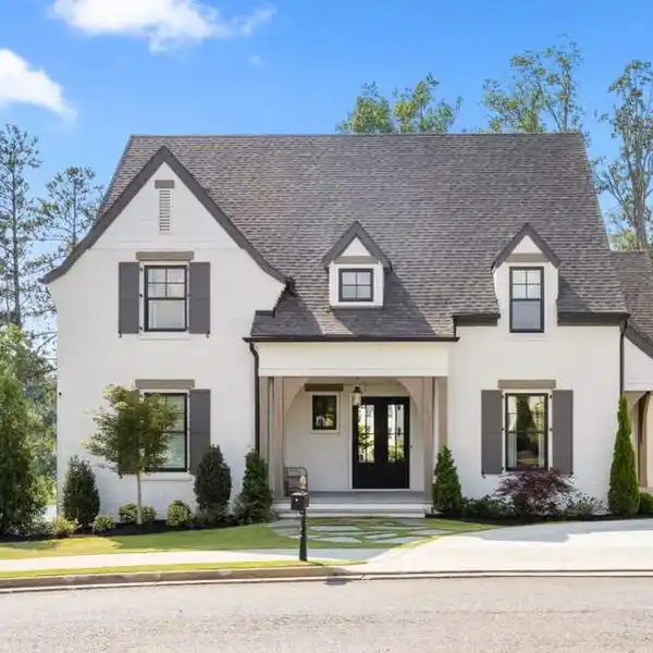 CHARMING BRICK HOME OVERLOOKING A SPRING-FED POND