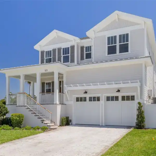 DELIGHTFUL NEW HOME ON A PRIME SNELL ISLAND CORNER LOT