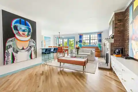 Sun-Drenched Duplex with Large Balcony