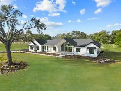 EXTRAORDINARY CUSTOM HOME IN EXCLUSIVE DYLAN’S GROVE