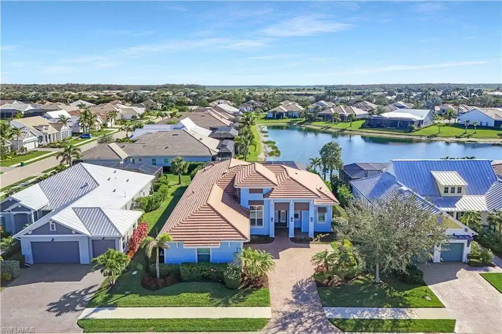 The Epitome of Lakefront Living in Naples Reserve