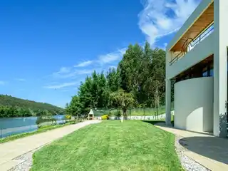 Architectural Villa with Private Mooring and Riverfront Views