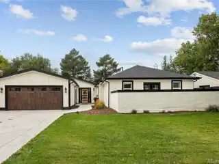 Modern Luxury Home Featuring Vaulted Ceilings and Patio