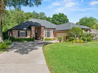Elegant Brick Home with Tranquil Water Views